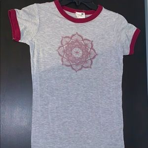 A T-shirt with a cool flower on it.